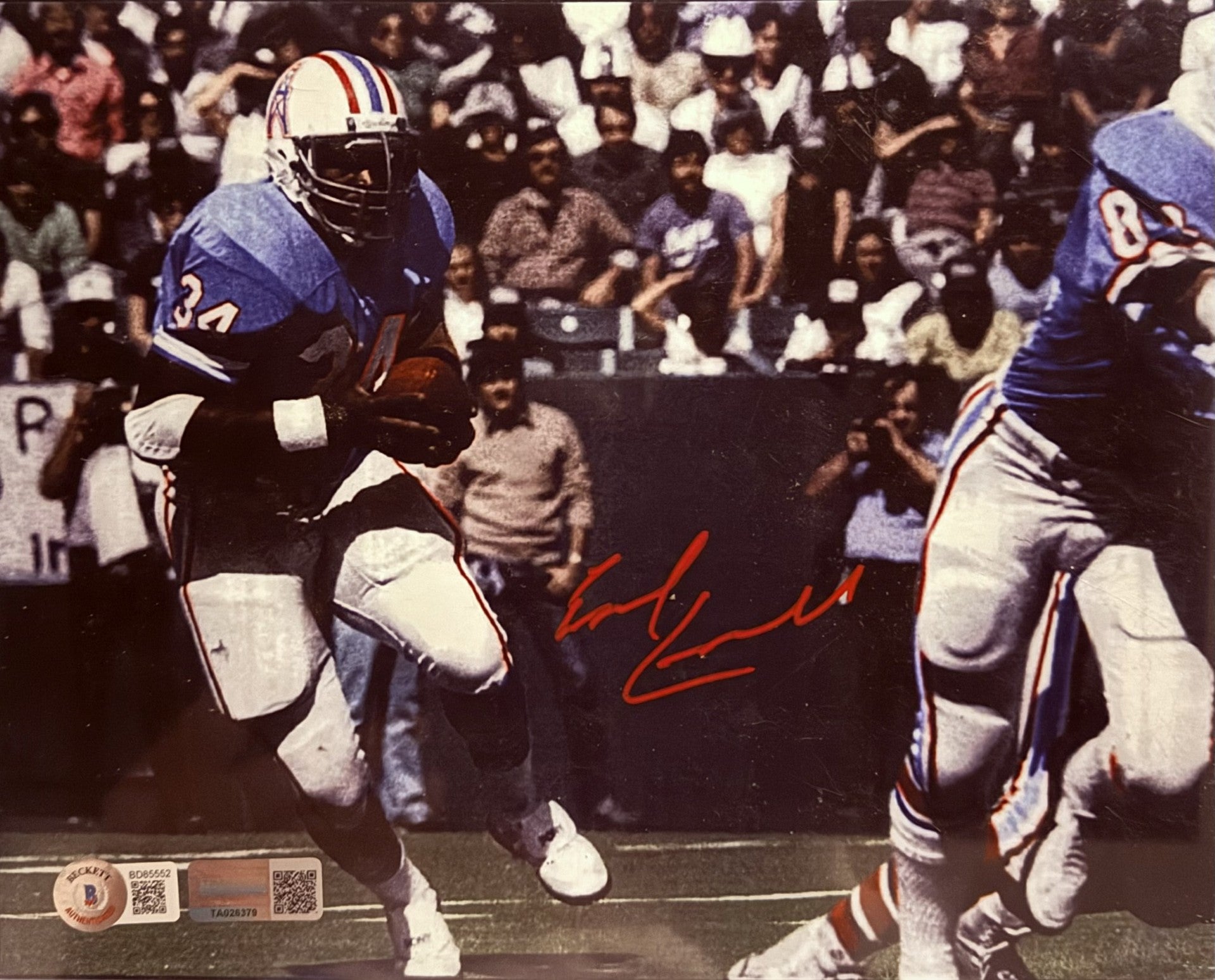 Earl Campbell Two Autographed Photos (NFL)